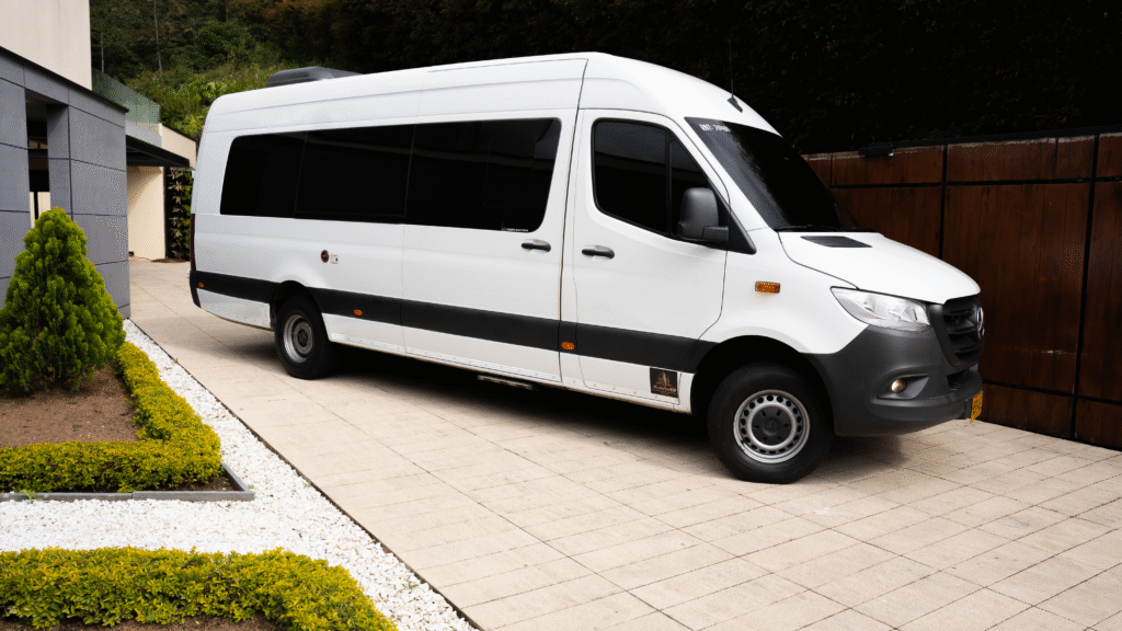 Private van airport transfer Medellín – Mercedes Sprinter side view for VIP group travel